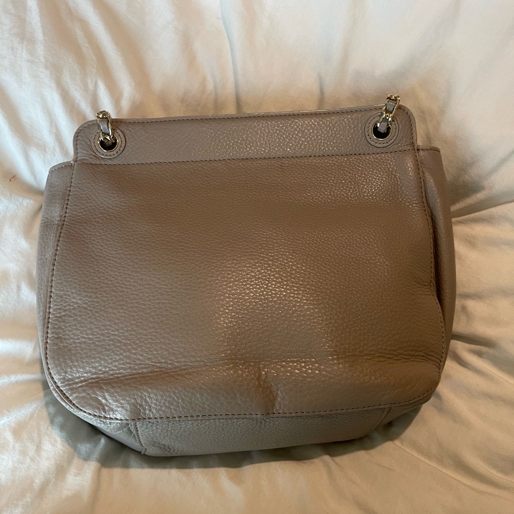 Almosty new Tory Burch bag wore few times in a very good condition.